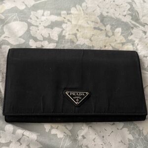 Vintage Prada Black nylon wallet. Leather inside